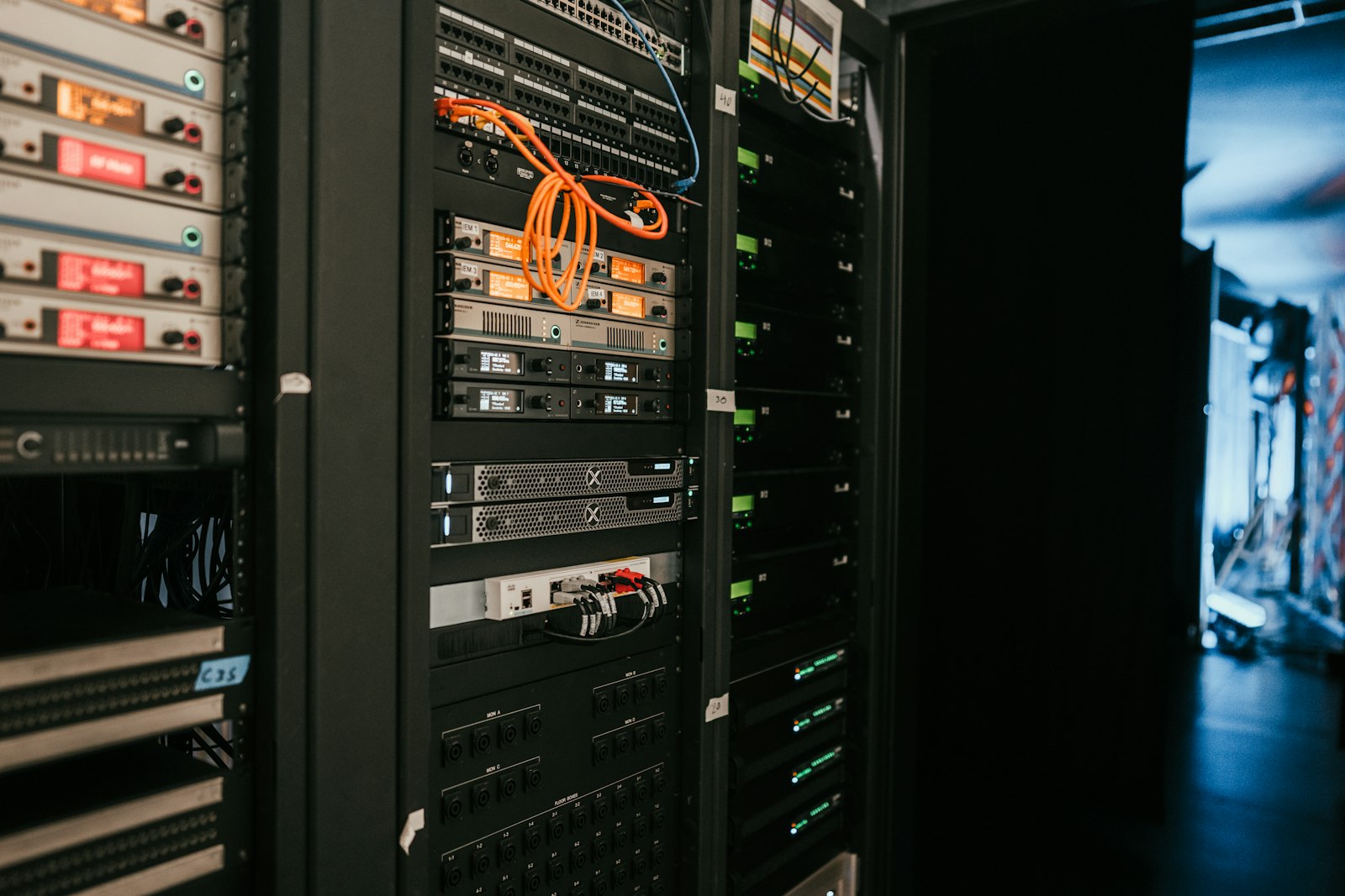 Glowing server rack with a warning lock icon representing the Starlette vulnerability threatening AI agent infrastructure