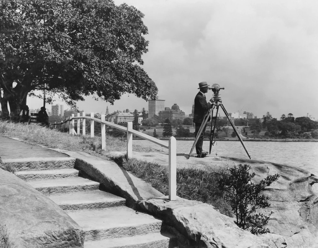A surveyor sets up his instrument at Mrs Macquarie’s Point, Sydney